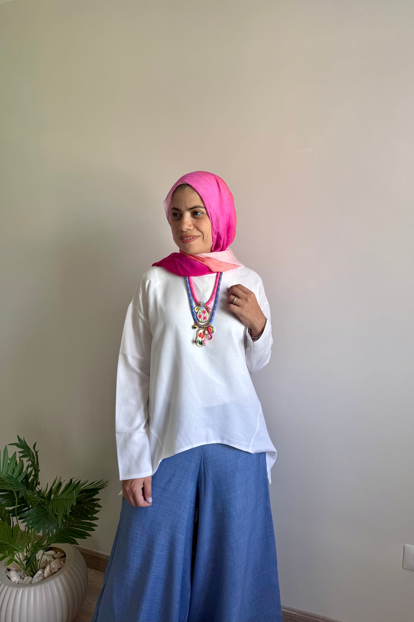 بلوزة اوفر سايز بقصات جانبيه